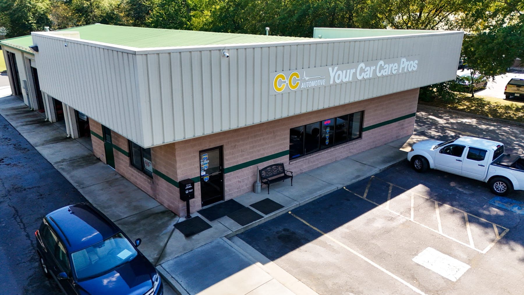 Aerial view of the C&C Automotive Aiken shop on East Pine Log Road, with the Your Car Care Pros sign over the front door.